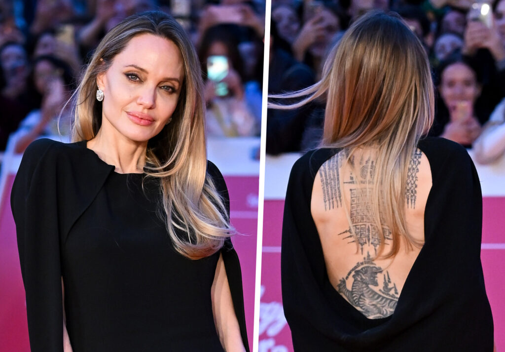 Angelina Jolie sul red carpet a Roma sfoggia gli enormi tatuaggi sulla schiena: in total black, è la più fotografata del Cinema Fest 2025